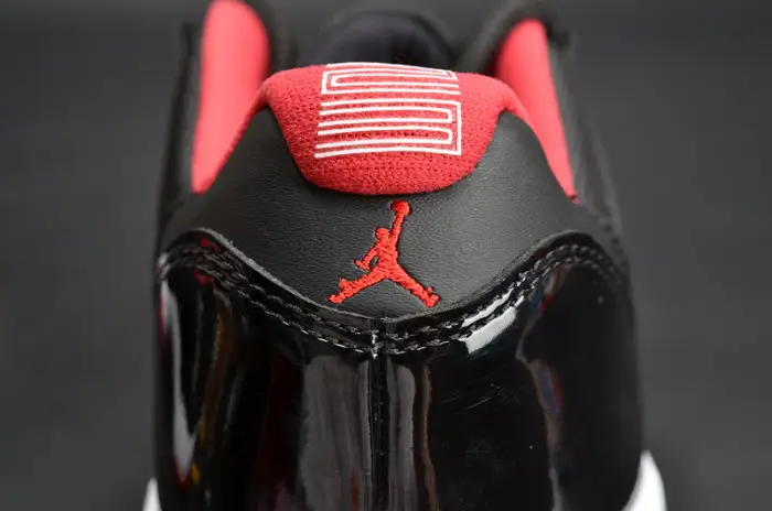 AIR JORDAN 11 RETRO LOW "BRED" BLACK  RED mens 