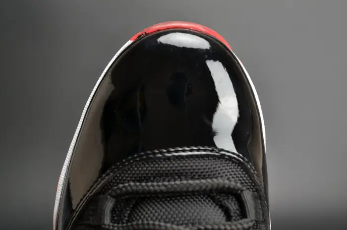 AIR JORDAN 11 RETRO LOW "BRED" BLACK  RED mens 