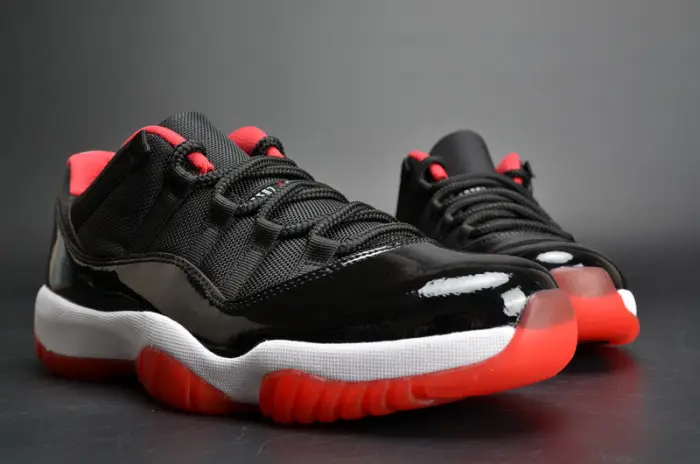 AIR JORDAN 11 RETRO LOW "BRED" BLACK  RED mens 