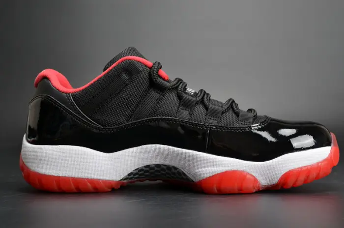 AIR JORDAN 11 RETRO LOW "BRED" BLACK  RED mens 