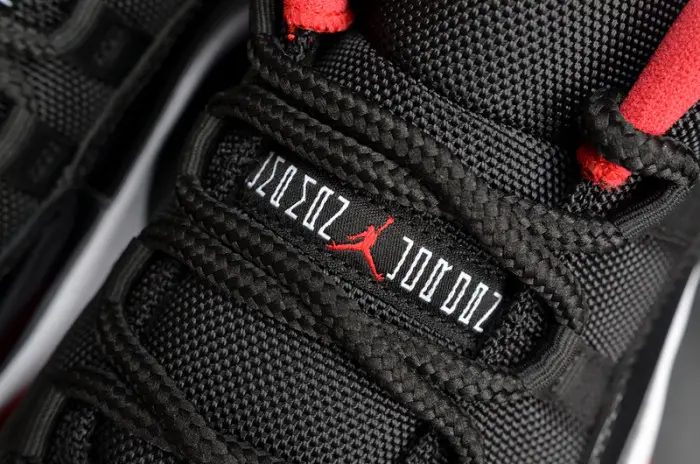 AIR JORDAN 11 RETRO LOW "BRED" BLACK  RED mens 