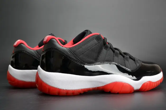 AIR JORDAN 11 RETRO LOW "BRED" BLACK  RED mens 