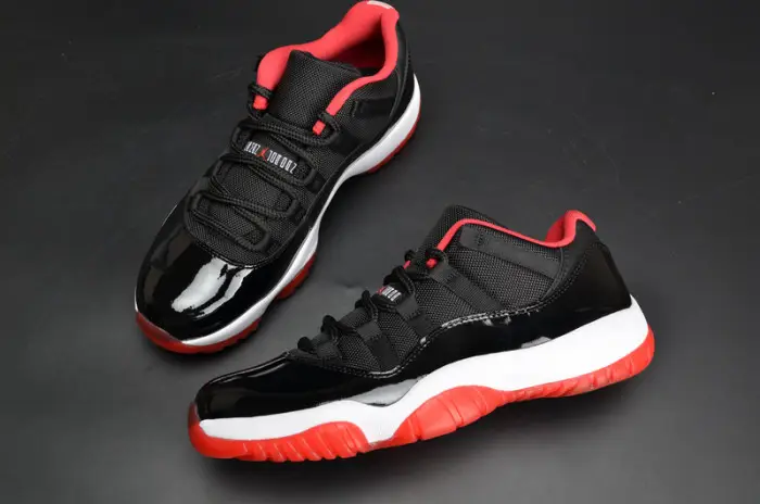 AIR JORDAN 11 RETRO LOW "BRED" BLACK  RED mens 