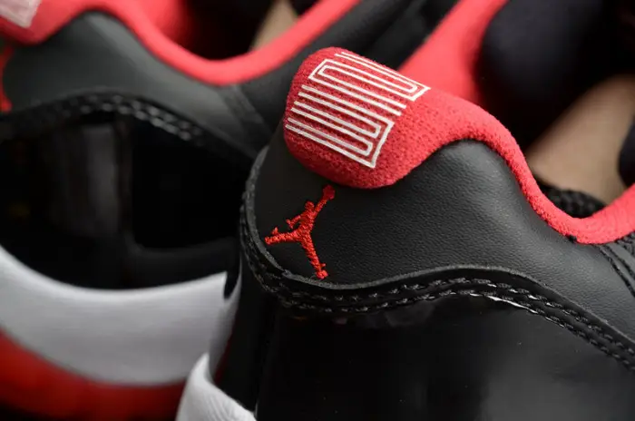 AIR JORDAN 11 RETRO LOW "BRED" BLACK/ RED mens DBFC610