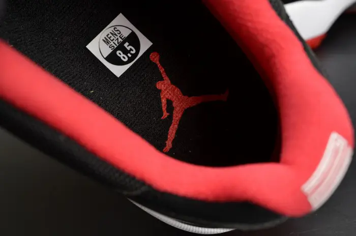 AIR JORDAN 11 RETRO LOW "BRED" BLACK  RED mens 